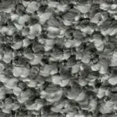 Grayscale abstract texture composed of overlapping, petal-like shapes in varying tones, creating a dense, organic pattern with depth and movement.